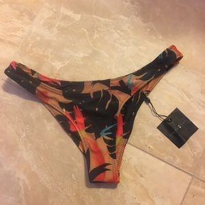 Stone Fox Swim bikini bottom in Vibration pattern